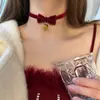 Colar de Natal com laço e sino para joias transfronteiriças, gargantilha doce, corrente de pescoço vinho tinto, corrente de clavícula de pelúcia