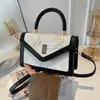 Bolso de mano cruzado de un solo hombro para mujer, versátil, con lazo, de nicho transfronterizo, fresco y elegante, nueva moda