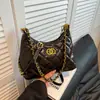 Bolso pequeño de cubo acolchado de alta gama con cadena para el hombro y para llevar debajo del brazo, bolso de mano pequeño de moda de nicho, bolso cruzado, moderno
