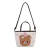 Bolso de hombro infantil estilo caricatura japonés y coreano, bolso de mano de lunares, bolsa de asas de gran capacidad, bolso de mano transfronterizo 2026