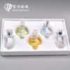 Lugar de fábrica 7.5ml botella cuadrada pequeña plana redonda coco oportunidad de muestra encuentro muestra botella de perfume versión Q perfume