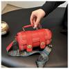 Bolsa de moda europeia e americana feminina 2024 primavera e verão nova bolsa cilíndrica da moda alça de ombro larga bolsa transversal de ombro