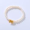 Venta al por mayor: Pulsera de perlas con lazo de princesa Escape, estilo Chanel, sencilla y combinable, accesorios para niñas.
