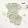 Comercio Electrónico Transfronterizo Conjunto de Bebé Recién Nacido Conjunto de Camiseta de Manga Corta y Shorts Algodón Orgánico Certificado GOTS Ropa para el Hogar Ropa para Exteriores