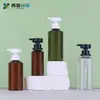 Nuevo producto en stock: Botella de bomba con interruptor para loción de 100-280 ml, botella dispensadora con hombro inclinado, botella de empaque cosmético al por mayor
