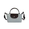 Bolso Cubo de Diseño Nicho Coreano con Parches de Lunares para Mujer 2026 Modelo Nuevo Exquisito Bolso de Hombro Cruzado para el Viaje Diario