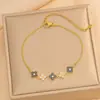 Collar Cruzado Versátil de Nácar Trébol de Cuatro Hojas Acero de Titanio Joyería de Lujo Ligero Alto Gama Diseño de Moda Accesorio de Cadena para Clavícula