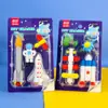 Goma de borrar mini de dibujos animados Qihao traje de goma de borrar espacial creativo goma de borrar para estudiantes pequeño regalo para estudiante de primaria