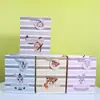 Bolso de Mano con Tarjeta Blanca de Serie Animada Transfronteriza en stock Bolsa de Regalo Artesanal con Polvo Dorado Bolsa de Embalaje de Cartulina al por Menor