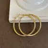 Brincos de Argola Simples com um Toque de Nicho e Alto Padrão, Cor Dourada, Brincos Circulares Elegantes, Estilo Europeu e Americano, Exagerados, Minimalistas, Acessórios Versáteis para Outono e Inverno
