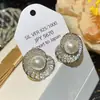 Pendientes Retro de Espiral con Hoja de Loto y Perla Estilo Francés, Elegantes y Versátiles para el Trabajo, Pendientes de Lujo Ligero y Nicho de Alta Gama para Mujer
