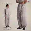 Customização da Tendência de Correntes Outono/Inverno 2026 Novas Calças Curvas Estilo Vintage com Forro de Lã para Homens, Calças de Perna Larga Retro da Moda, Calças Longas para Casais.