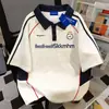Camiseta de Algodón 100% Puro Estilo Retro Americano con Cuello Polo de Manga Corta para Hombres y Mujeres, Verano Holgada Adelgazante de Longitud Media para Parejas