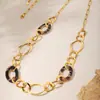 Rueda de la fortuna ovalada estampado de leopardo suéter largo de otoño e invierno para mujer collar diseño de personalidad acero inoxidable chapado en oro real de 18 quilates