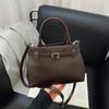 Popular transfronterizo este año popular bolso pequeño de mujer 2025 nuevo bolso bandolera retro versátil nicho portátil bolso cubo