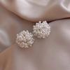 Xu Daqing con aretes de perlas 2023 nuevos aretes aretes de flor blanca francesa aretes exagerados sin perforaciones para mujeres