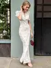 Estilo Novo Primavera e Verão 2026 Moda Europeia e Americana Transfronteiriça Vestido Floral para Mulheres, Vestido Longo de Alto Padrão com Decote em V Profundo e Temperamento Elegante