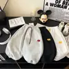 Pantalones deportivos bordados de estilo coreano para niños, nueva colección de primavera para niños y niñas, elegantes y modernos con un diseño de pierna cónica