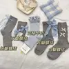 Meias Xadrez Cinza-Azul Versáteis de Renda Japonesa com Laço Fofo para Primavera e Outono Meias Koreanas de Alto Valor Caídas para Meninas