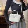 Bolsa de Laço para Mulheres 2026 Nova Tendência de Nicho Bolsa de Mão Fofa Fashionable Bolsa Transversal para o Dia a Dia Bolsa Feminina Fresca e Estilosa