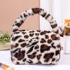 Cross-border Hot Sale American Faux Leopard Plush Bolsa de cosméticos portátil Wash Travel Storage Bag Factory Outlet