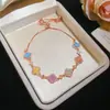 [Cadena de Diamantes Arcoíris] Pulsera de extracción de zircón trenzado en cruz, una pulsera lujosa y de alta gama, una pieza de joyería delicada y de moda