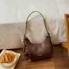 Bolso Sencillo Bajo el Brazo 2026 Otoño Nuevo Llegada Bolso Cruzado de Hombro Único Personalizado Moda Color Sólido Bolso Dumpling Bolso de Mano Casual