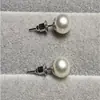 8 Pendientes Redondos de Perlas de Imitación de Alto Brillo 2025 Nicho Simples Versátiles Pendientes para Mujer Joyería Venta al por Mayor No