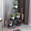Prateleira de flores multicamadas de ferro por atacado sala de estar interna varanda de chão para uso doméstico simples rack de vaso de flores rabanete verde suculento