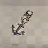 Estilo marino transfronterizo nuevo artículo charm de zapato de estrella de mar concha colgante azul marino hebilla de cordón de zapato compatible con papá de entrenamiento alemán zapatos de ballet