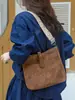 Bolso tote transfronterizo nuevo, bolso de mujer de gran capacidad, diseño de nicho moderno, bolso de hombro retro de PU para mujer estilo europeo y americano