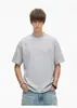 Camiseta trendy estilo americano com gola redonda, bordada, de manga curta para homens, design versátil e moderno estilo ins, top soltinho para casal