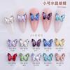 Nuevos Pequeños Estéreo Cristal Arte de Uñas Mariposa DIY Aleación Accesorios Decoración Lazo Aurora Venta al por Mayor