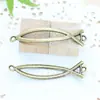 Accesorios para joyería de aleación DIY 48*12mm pez curvo hueco doble agujero accesorios para pulsera joyería de espina de pez