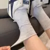 Calcetines grises de mujer hasta la pantorrilla, estilo primavera/verano, algodón puro, calcetines largos transpirables, adecuados para zapatillas de entrenamiento alemanas, calcetines posparto, calcetines holgados para el verano