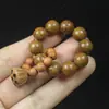 Sándalo verde sándalo dorado giro manual pequeño loto punta del dedo texto juego cuerda para la mano hombres y mujeres alrededor del dedo de suaves cuentas de Buda rosario joyería al por mayor