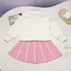 Conjunto de suéter para niña, nuevo estilo otoño/invierno, diseño coreano, con un lazo y estampado jacquard, que incluye un cárdigan y una falda corta, un conjunto de dos piezas para bebés