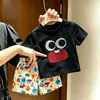 2026 Novo Conjunto de Verão Infantil Olhos de Desenho Animado Fofos Manga Curta Shorts Super Fofos de Desenho Animado Conjunto de Duas Peças Versátil