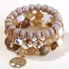 Pulsera de Estilo Bohemio Nueva y Popular de Venta Caliente de Fábrica con Cuentas de Arroz Pulsera para Mujer Multicapa de Cuero Tejida a Mano Mano