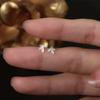 Pendientes de botón de plata de ley S999 plata pura para mujer Hojas japonesas y coreanas Exquisitos simples Clavos para el cartílago de la oreja Diseño de nicho INS Sentido de diseño Oreja de celebridad de Internet