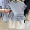 Nuevo conjunto de verano para niñas 2025 Camiseta con volantes de manga corta Pantalones de pierna ancha de color liso Conjunto de dos piezas Traje de verano