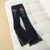Jeans de campana acampanados con dobladillo deshilachado retro y abertura para mujer, nuevo estilo de verano 2026, tiro alto, corte ajustado, diseño elegante
