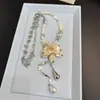Elegante y sencillo collar de borla floral con cuentas para mujer, nuevo modelo 2026, cadena para suéter versátil y única