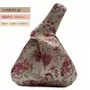 Venta al por mayor del fabricante Empaques de regalo grandes y pequeños Bolsas de regalo de almacenamiento Bolsas de mano con asa única estilo chino para recuerdos