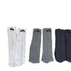 Calcetines de pantorrilla estilo coreano para otoño e invierno Ioulor con logo de letra, calcetines casuales de color liso con rizo de algodón para aeróbicos, calcetines Zhuji al por mayor