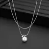 Collar de perlas apiladas de doble capa para mujer, novedad de 2024, cadena de clavícula de lujo ligera y elegante de alta gama.