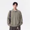Nova Camisa Polo com Capuz Masculina Estilo Americano Primavera e Outono Solta Confortável Casual Versátil Manga Longa Gola Lapela Camiseta Masculina Tendência