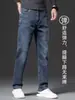 Jeans Masculino Xintang Outono High-End Solto de Perna Reta 2026 Novo Lavado Stretch Casual de Negócios Calças Longas