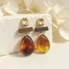 Estilo europeo y americano, transfronterizos, aretes colgantes con dije de lágrima de madera color café, con un diseño único y elegante, estilo minimalista, y un toque de lujo y sofisticación, perfectos para mujeres