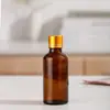 Frasco de Vidro Marrom Escuro para Óleo Essencial Atacado Frasco Portátil com Conta-gotas de Cabeça de Borracha Frasco Pequeno para Amostra de Essência Cosmética